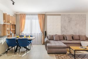 Posezení v ubytování Ski Escape Poiana Brasov Residence