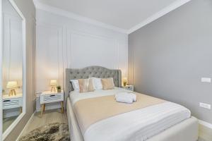 Postel nebo postele na pokoji v ubytování Ski Escape Poiana Brasov Residence