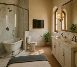 a bathroom with a tub and a toilet and a sink at Sidena Bovest in Rasa