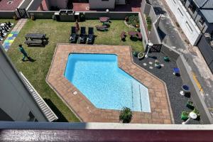 Bazén v ubytování Costa Smeralda by First Private Stays nebo v jeho okolí + 10 fotografií