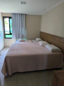 Postel nebo postele na pokoji v ubytování Village Praia do Forte - Complexo Iberostate