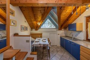 Kuchyň nebo kuchyňský kout v ubytování B&B Soreghina + 35 fotografií