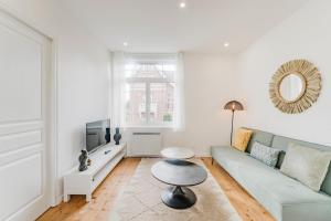 Posezení v ubytování Appartement 1 chambre proche Croisé Laroche & tram