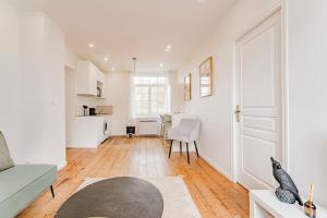 Kuchyň nebo kuchyňský kout v ubytování Appartement 1 chambre proche Croisé Laroche & tram