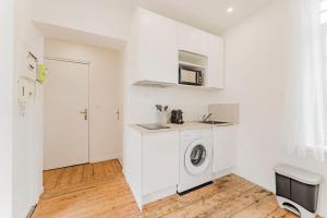 Kuchyň nebo kuchyňský kout v ubytování Appartement 1 chambre proche Croisé Laroche & tram