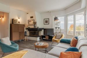 Posezení v ubytování Le Montagny Sejour Cosy au Coeur des Alpes