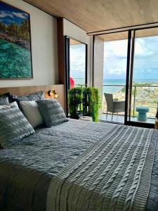 Una cama o camas en una habitación de Studio Beira Mar com Vista Mar NT1318