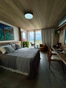 Una cama o camas en una habitación de Studio Beira Mar com Vista Mar NT1318