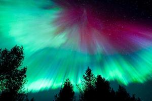 an image of the northern lights in the sky at Santa's Luxury Suite 3BDR, Sauna & Wifi in Rovaniemi