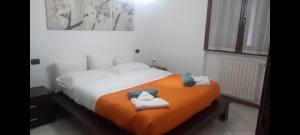 Ένα ή περισσότερα κρεβάτια σε δωμάτιο στο JeeG