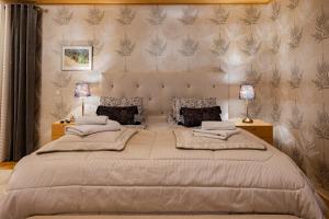 Ένα ή περισσότερα κρεβάτια σε δωμάτιο στο Maison Aho by Alvar Aalto Rovaniemi-Lapland