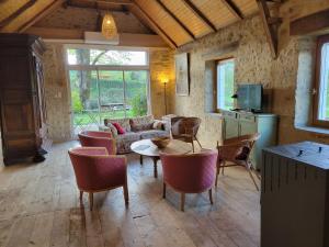 Μια τηλεόραση ή/και κέντρο ψυχαγωγίας στο Gîte La maison de Galut