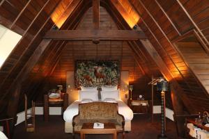 Postel nebo postele na pokoji v ubytování Auberge Bout de Bois + 41 fotografií