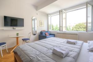 Postel nebo postele na pokoji v ubytování STUDIO APARTMENT SiLVER