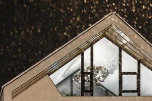 a window in the roof of a building at MYALPS Tirol inklusive Sky- Wellness in Oetz +50 photos