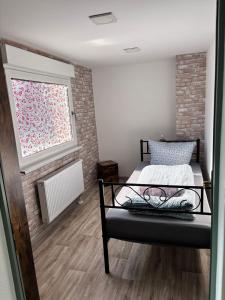 Ένα ή περισσότερα κρεβάτια σε δωμάτιο στο Ferienhaus Panorama