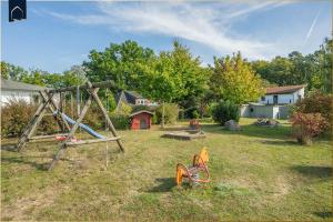 Ο χώρος παιχνιδιού για παιδιά στο Villen am See - 4-Raum Häuser DHH See- Idyll 2