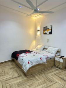 Katil atau katil-katil dalam bilik di Fly voyage hébergement