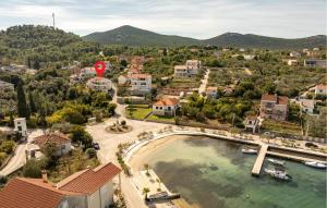 an aerial view of a small town with a harbor at Beautiful Apartment In Lukoran With Wifi in Lukoran