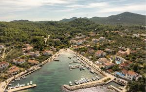 an aerial view of a river with boats docked at Beautiful Apartment In Lukoran With Wifi in Lukoran