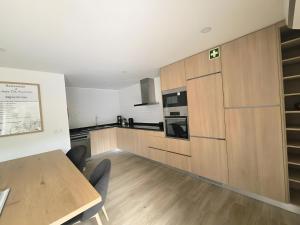 Kuchyň nebo kuchyňský kout v ubytování Casa Aurora