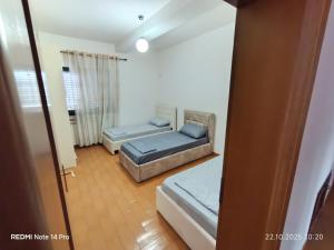 Postel nebo postele na pokoji v ubytování Mountain budget guesthouse + 4 fotografie