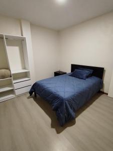 Postel nebo postele na pokoji v ubytování Departamento completo en Cuenca Ecuador + 12 fotografií