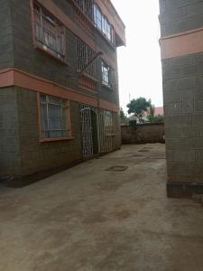 an empty parking lot in front of a building at Swahiba's 254 in Keruguya
