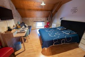 Postel nebo postele na pokoji v ubytování L'entre Deux Vignes + 24 fotografií