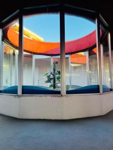 a view of a building through a window at Searoom in Lido delle Nazioni
