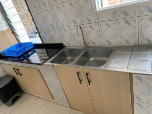 Kuchyň nebo kuchyňský kout v ubytování Inkindi House + 69 fotografií