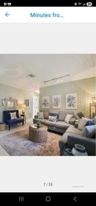 a living room with two couches and a couch at Crystal Blue Haven in Crystal River