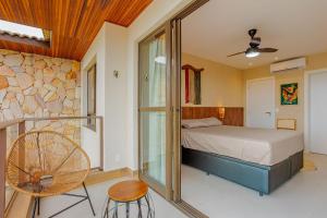 Giường trong phòng chung tại GB128 Excelente Vilage 4/4 em Guarajuba +51 ảnh