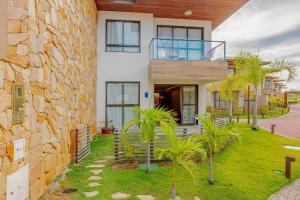 Vườn quanh GB128 Excelente Vilage 4/4 em Guarajuba