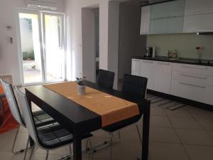 Kuchyň nebo kuchyňský kout v ubytování Gavza Luna Apartment + 31 fotografií
