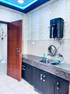 Kuchyň nebo kuchyňský kout v ubytování Peaceful Stay at Dil-E-Yaad