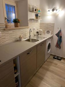 Η κουζίνα ή μικρή κουζίνα στο Portineria