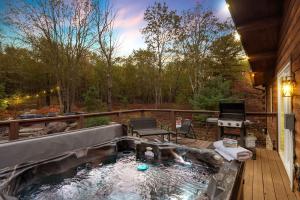 a koi pond on the deck of a house at Skypine Lodge - Log Lodge Atop the World in Jim Thorpe