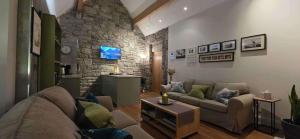 Μια τηλεόραση ή/και κέντρο ψυχαγωγίας στο Cottage - Sleeps 2 - Near Cliffs of Moher +7 φωτογραφίες