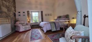 Ένα ή περισσότερα κρεβάτια σε δωμάτιο στο Cottage - Sleeps 2 - Near Cliffs of Moher