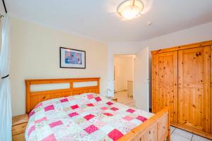 Ένα ή περισσότερα κρεβάτια σε δωμάτιο στο Haus Boddenkieker 6 Fewo Nr 1 +8 φωτογραφίες