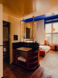 Ένα ή περισσότερα κρεβάτια σε δωμάτιο στο The Companion Vienna l Opening Spring 2026