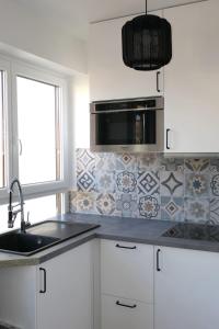 Η κουζίνα ή μικρή κουζίνα στο M007-8-9 Marquer Chambre colocation proche de la Gare