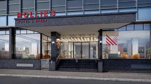 a hotel and dinner building with a sign on it at Mollie's Manchester in Manchester