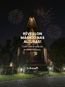 a building with fireworks exploding in the sky at Na Montanha Eco Space in Igrejinha