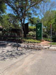 a stop sign on the side of a street at Lani Accommodation in Pretoria