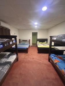Postel nebo postele na pokoji v ubytování Hostal Mafelo Taganga