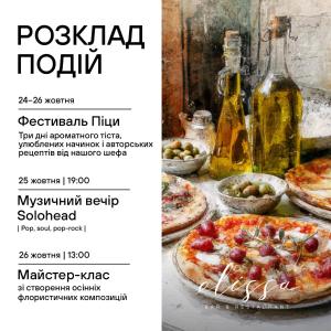 a menu with two pizzas and a bottle of wine at Il Decameron Luxury Design Hotel in Odesa