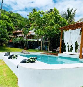 Πισίνα στο ή κοντά στο Casa Marrocos Arraial d'Ajuda