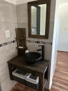 Koupelna v ubytování Cabaña El Quebrachal